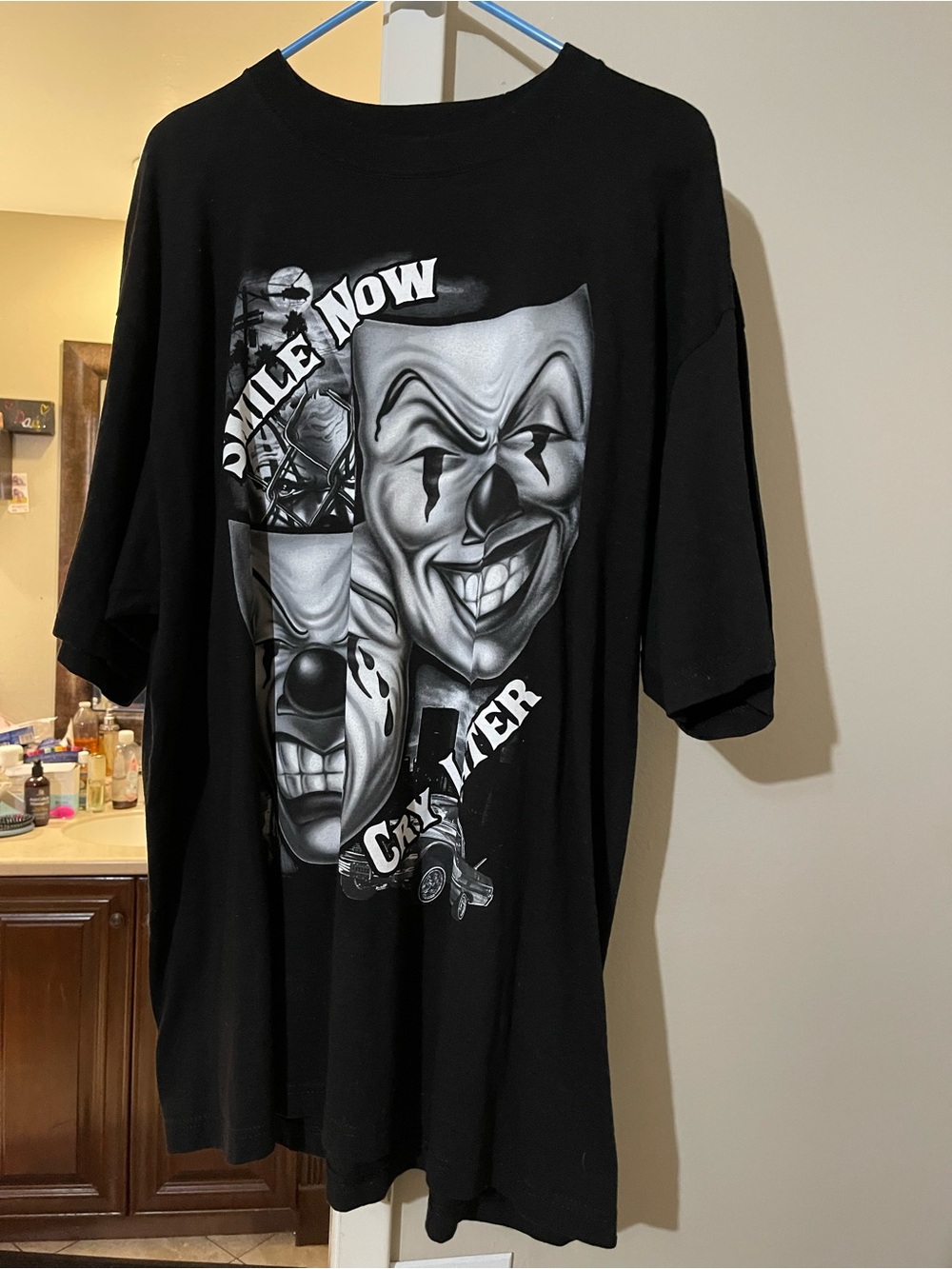 Black Graphic Tee with Smiling Mask Design